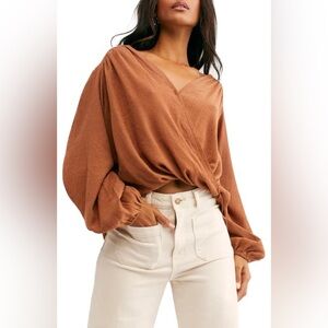 Free People Check On It faux wrap top in a rust/brown color